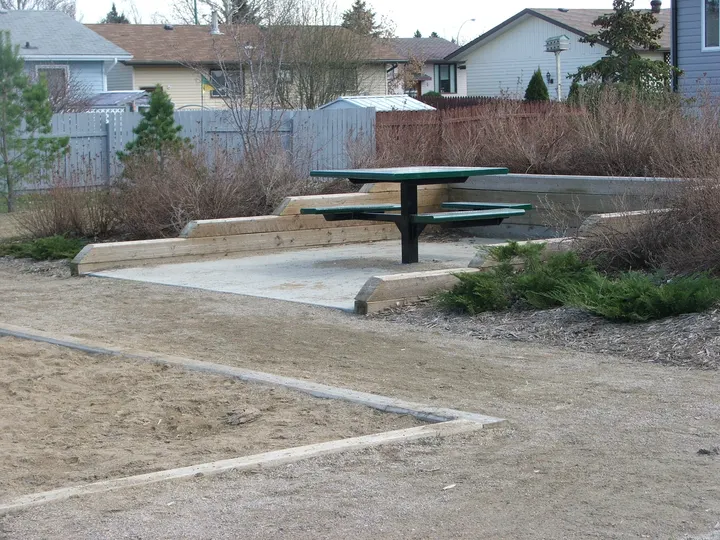Ground-level photograph of Claude Petit Park from the city park map.