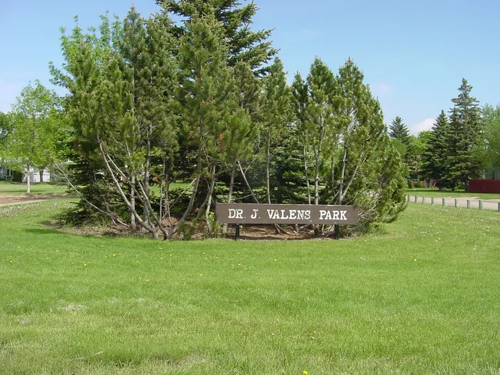 Ground-level photograph of Dr. J. Valens Park from the city park map.