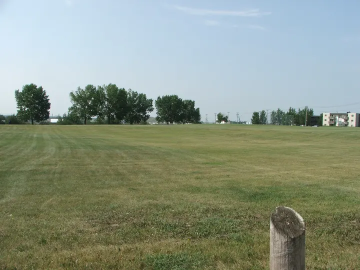 Ground-level photograph of Fred Mendel Park from the city park map.