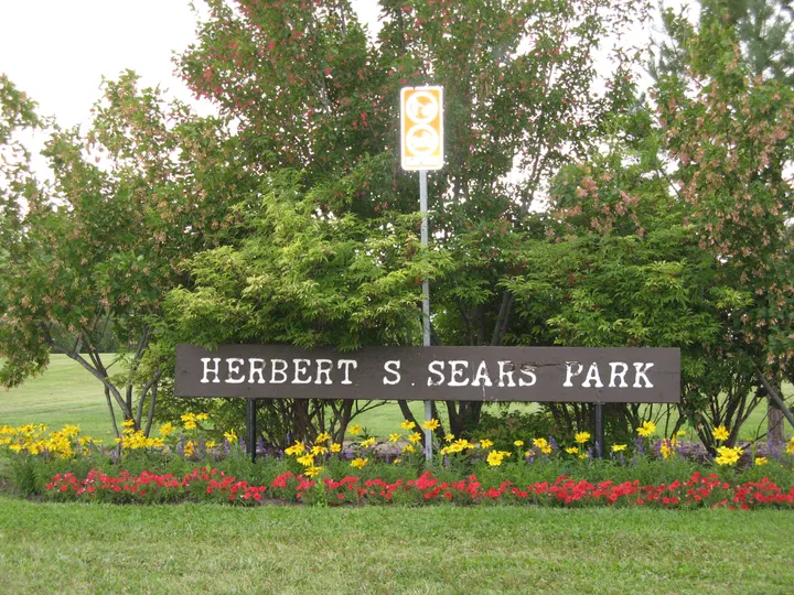 Ground-level photograph of Herbert S. Sears Park from the city park map.