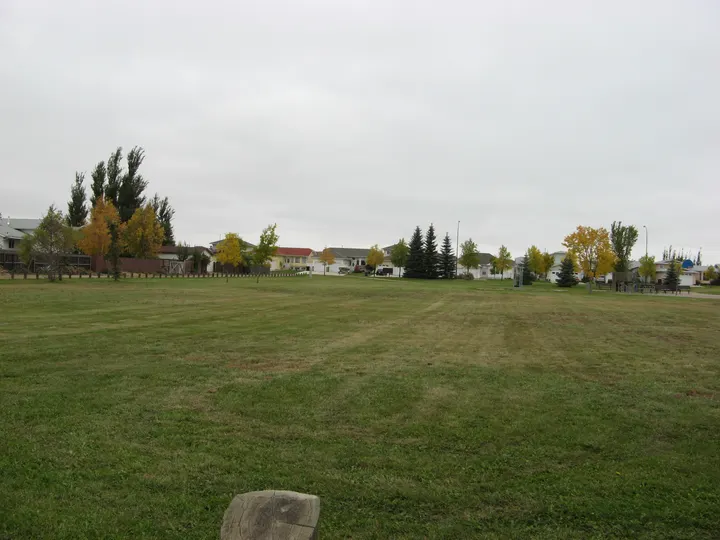 Ground-level photograph of Sen. J. Hnatyshyn Park from the city park map.